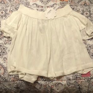 Shop Hope’s flowy off shoulder blouse